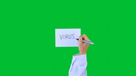 Arzt-Schreibt-Virus-Auf-Papier-Mit-Grünem-Bildschirm-01